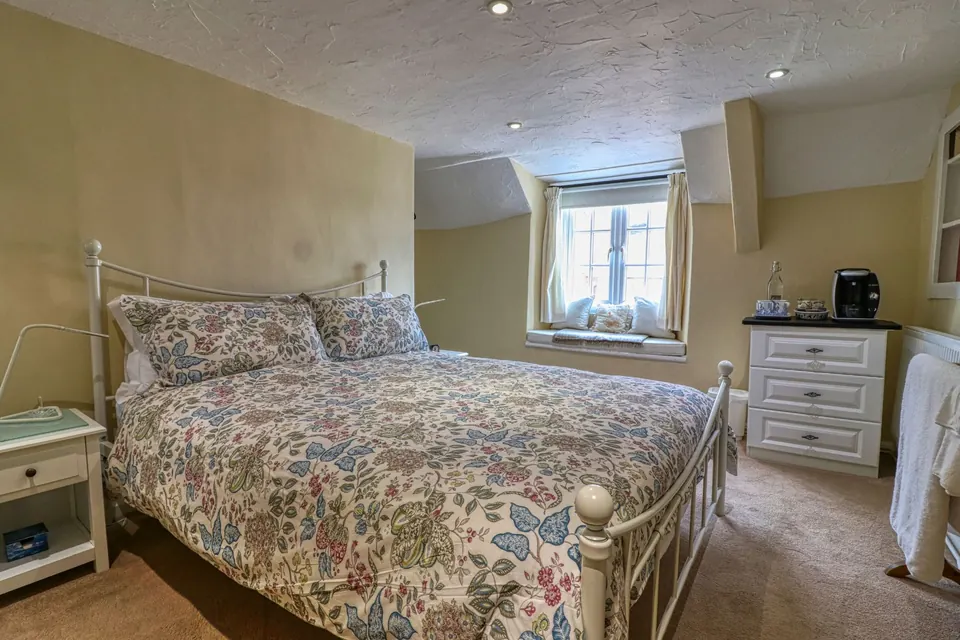 The Austen bedroom at The Old Bookshop in Williton