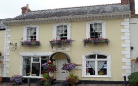 The cream-painted frontage of Exmoor House